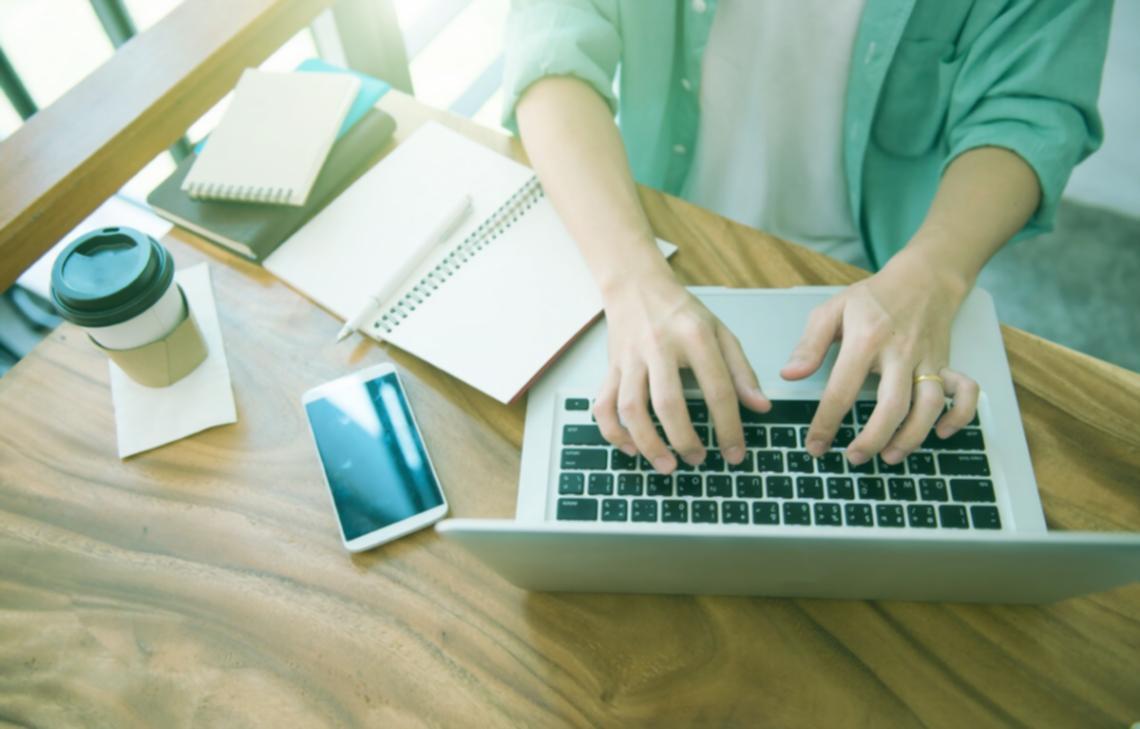 Strategic planning session with digital marketing materials and analytics dashboards